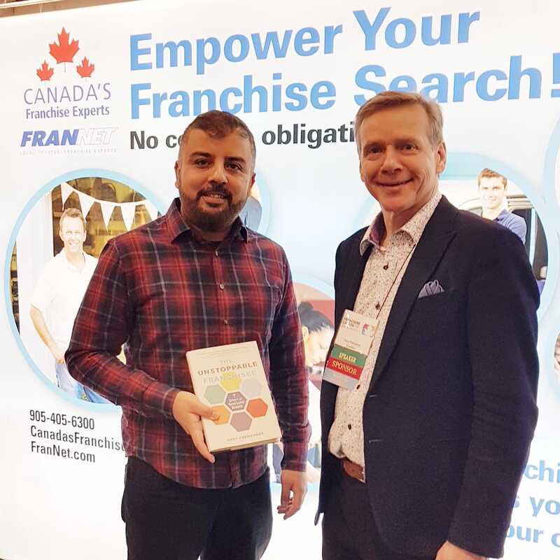 Rasheed Walizada with Gary Prenevost author of The Unstoppable Franchisee. At the Franchise Candad Show February 2023 Toronto.