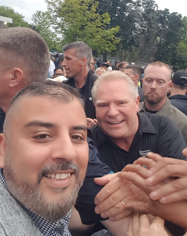 Rasheed Walizada With the Honourable Doug Ford Premier of Ontario at Ford Fest 2023. 
